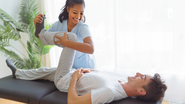 Chiropractor in Nine Elms providing hands-on treatment to a patient, illustrating the benefits of chiropractic care for local residents