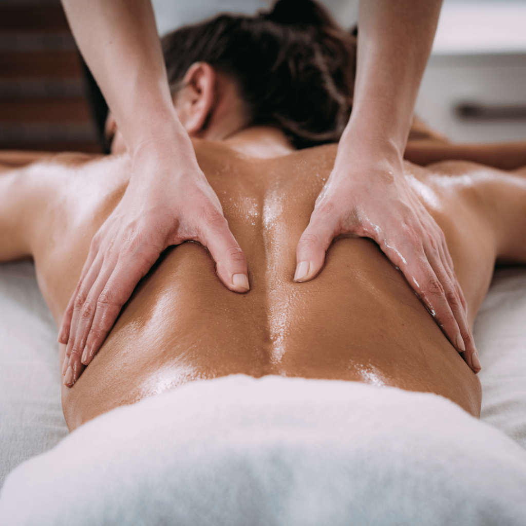 Sports massage Nine Elms therapists giving a patient of Nine Elms Chiropractic & Physiotherapy Clinic Deep Tissue Back Massage